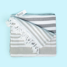 Load image into Gallery viewer, The finely loomed 100% Turkish cotton towel with hand tied tassels is super soft, made to last and will get softer after every use.
