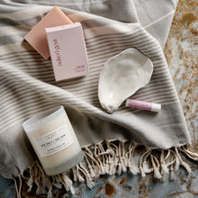 Load image into Gallery viewer, The finely loomed 100% Turkish cotton towel with hand-tied tassels is incredibly soft, durable, and gets softer with every wash.