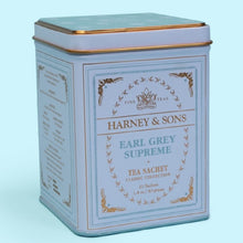 Load image into Gallery viewer, This Earl Grey tea from Harney &amp; Sons is crafted for a bold taste and packed in a decorative tin and delivers a light-bodied cup brimming with aromatic citrus notes.
