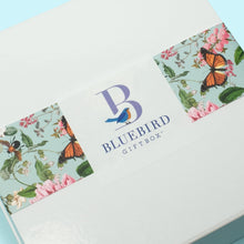 Load image into Gallery viewer, This Bluebird was inspired by one of our favorite places in Virginia – the Lewis Ginther Botanical Garden. As one of the top botanical gardens in the country, it never fails to inspire and bring joy. This giftbox recreates the sense of bringing a beautiful botanical garden indoors.