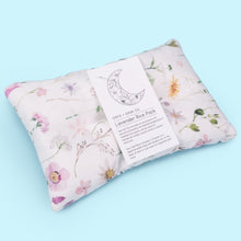 Load image into Gallery viewer, The handmade Lavender therapeutic wildflower rice pack helps with migraines, sore muscles, congestion and other aches and injuries. It can be used hot or cold.