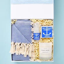 Load image into Gallery viewer, his By the Sea care package is designed to deliver joy and the scent of the sea to your loved one.
