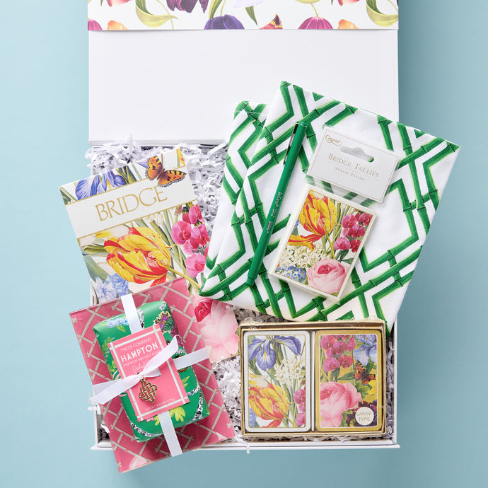 Victorians often associated tulips with charity and you will truly believe it is better to give than to receive when you send this blooming care package to your favorite bridge player. Bridge was designed for group play and this giftbox has everything needed for a lovely bridge party that encourages conversation and friendly competition among new and old friends.