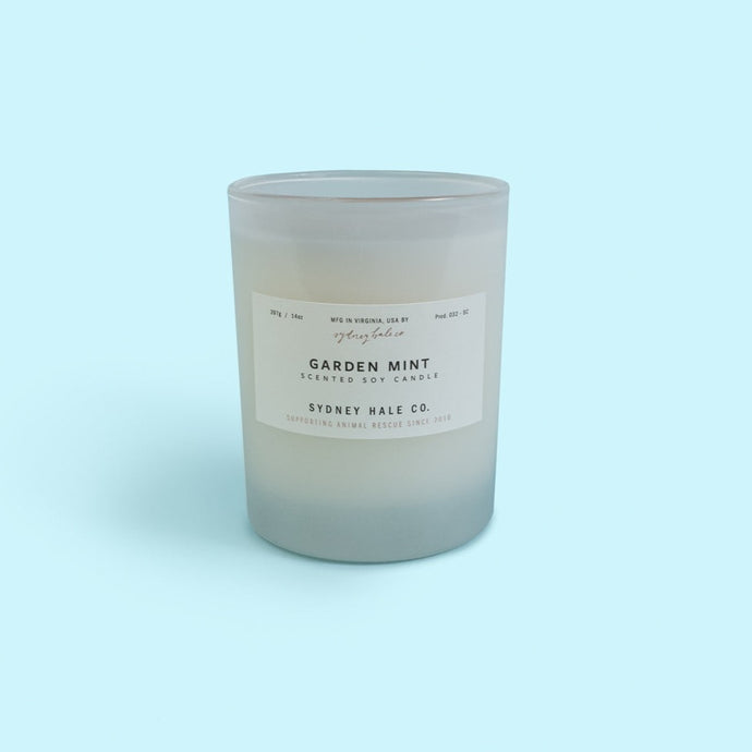 The Garden Mint Candle from Sydney Hale Co., handmade in Richmond, Virginia, brings the scent of fresh green mint from an herb garden, with notes of sweet basil and earth.* 